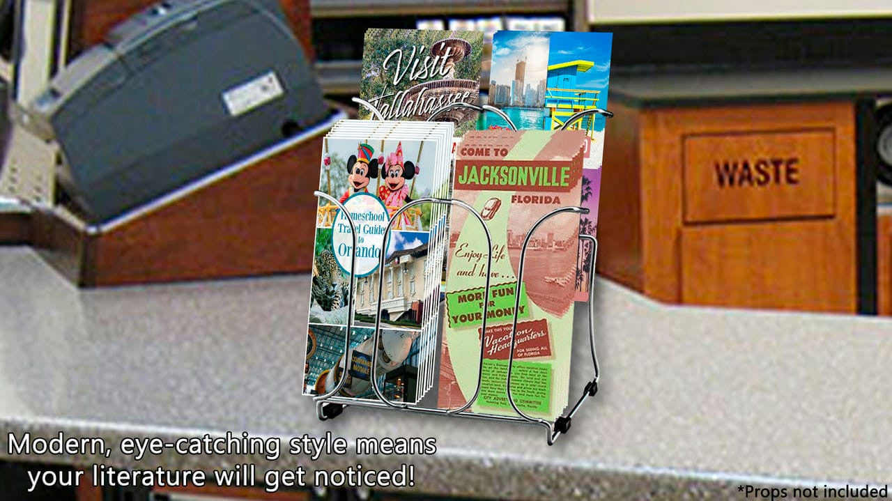 Chrome Wire Two Tier Brochure Holder Four Pocket Stand For Four inch Literature on a Countertop filled with  printed documents with a background