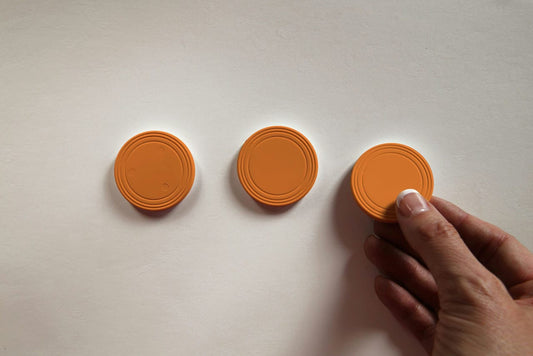 Orange replacement pucks for mini micro prize drop