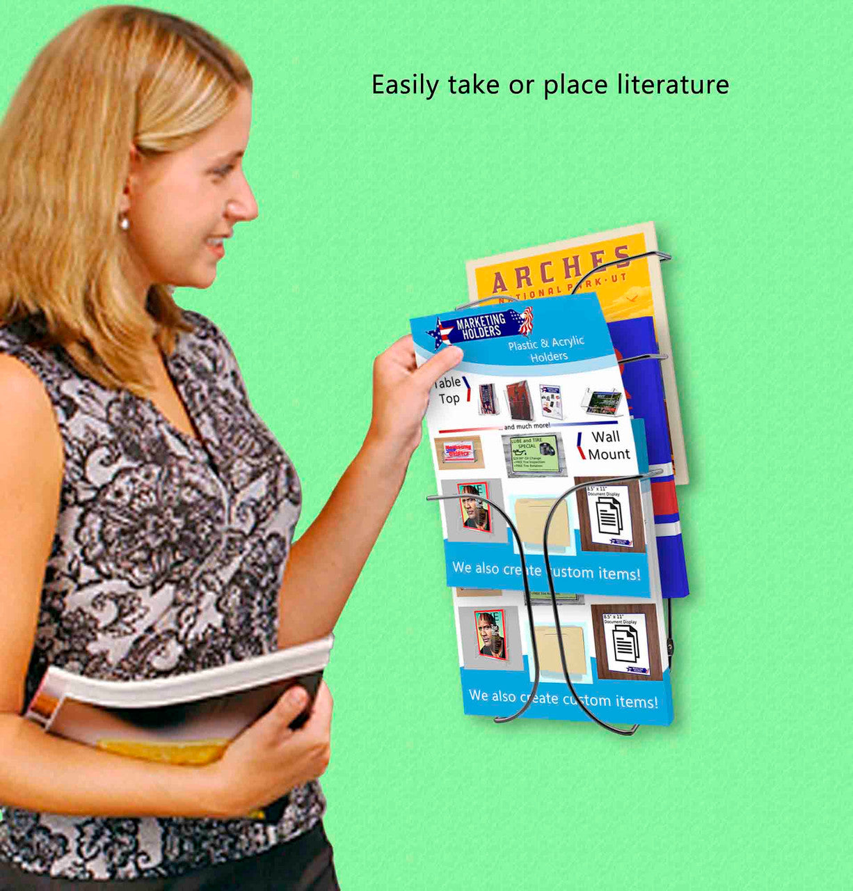 Nine Inch Wide Catalog Brochure Holder Wall Mount Chrome Wire Three Tier on a wall with literature and model