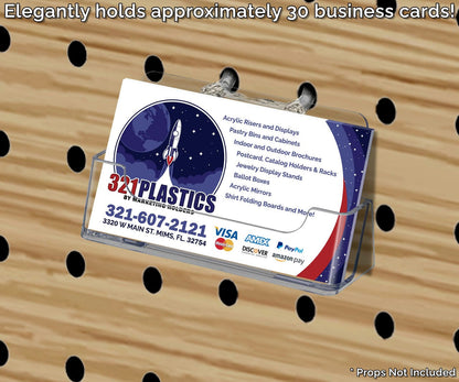 Pegboard Business Card Holder Appointment Rack Display filled with cards on a wall