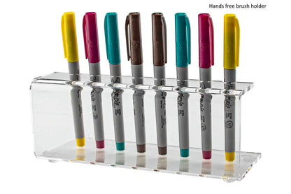 Pen and sharpie holder holds eight writing utensils with sharpies