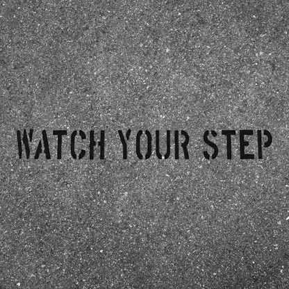 WATCH YOUR STEP Safety Stencil for Parking Lots and Pavement