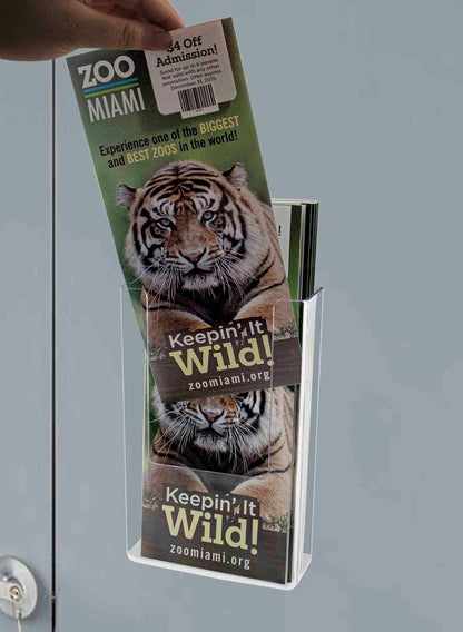 Magnetic literature holder on a door with trifolds