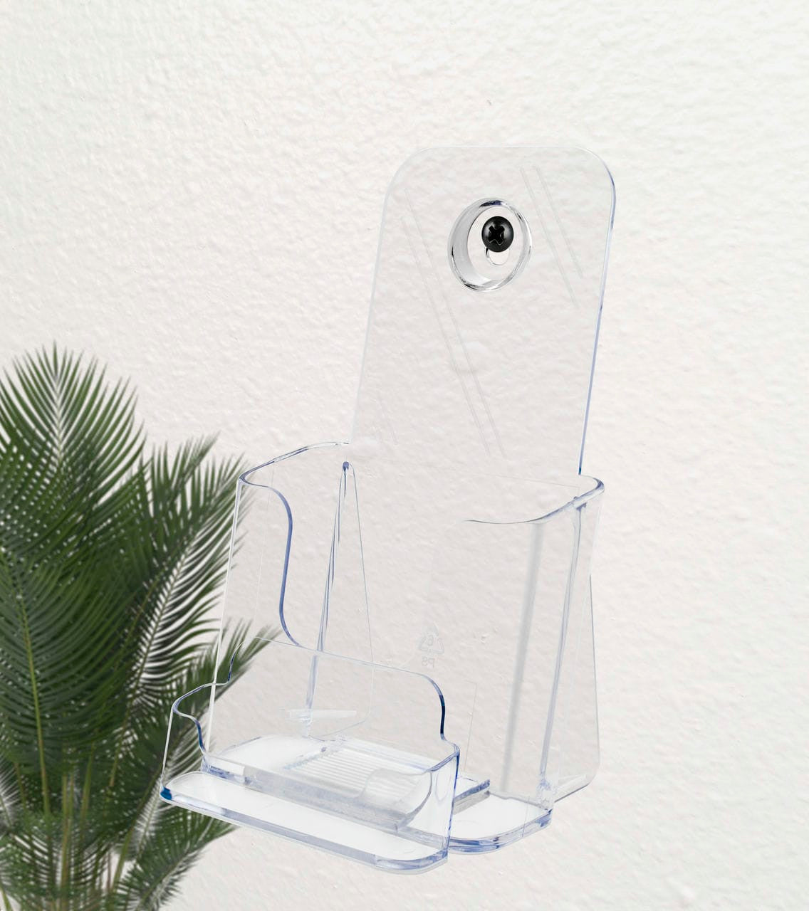 Slant Back Trifold Literature Holder with Business Card Holder hanging on a wall with a screw