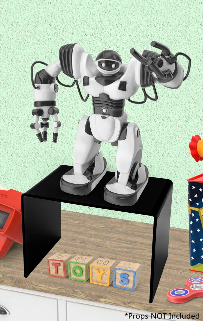 Black riser with a figurine on top of a desk