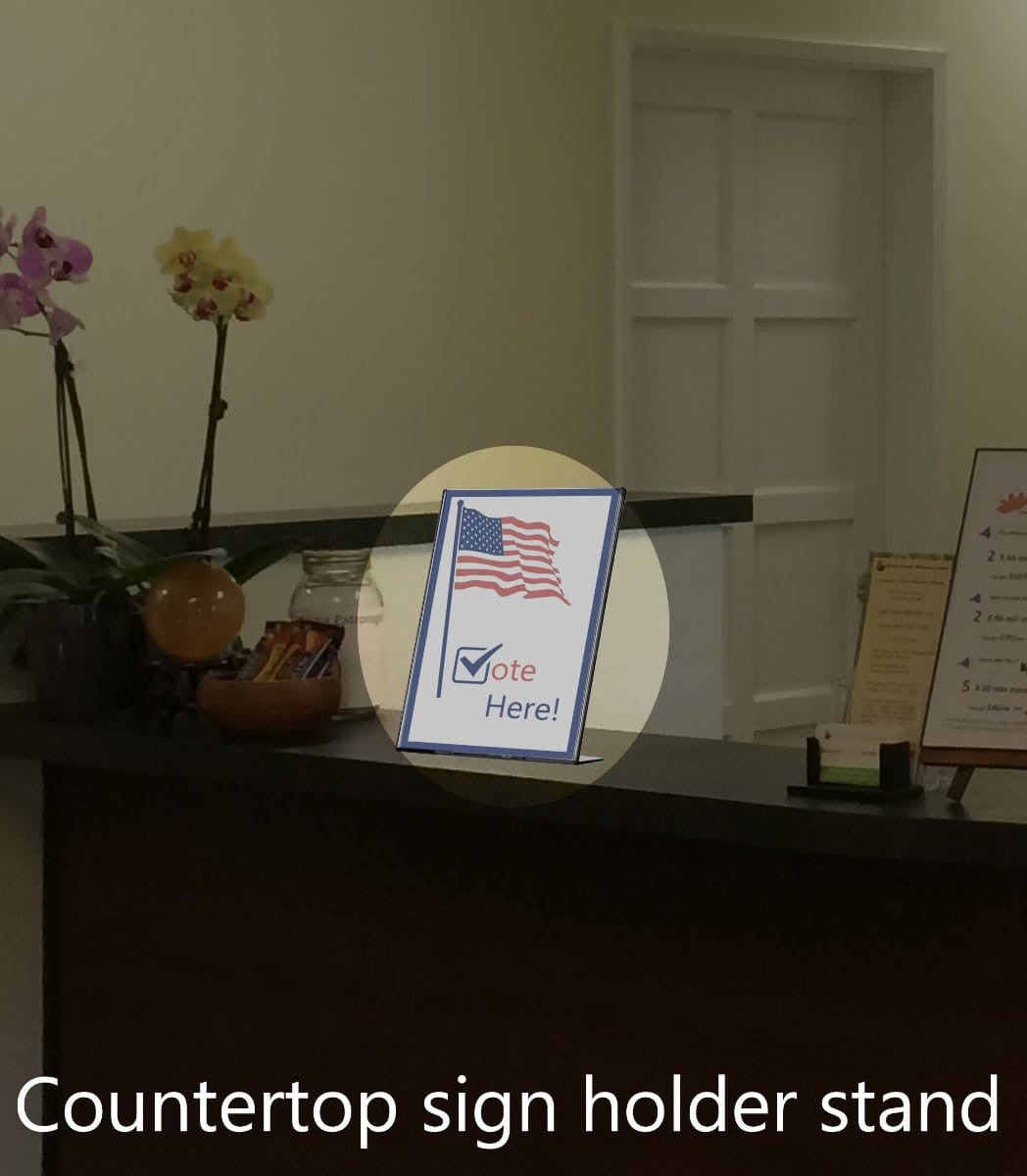 Sign Holder TRU-VU® Table Tent Top Load Wide Base on a retail counter